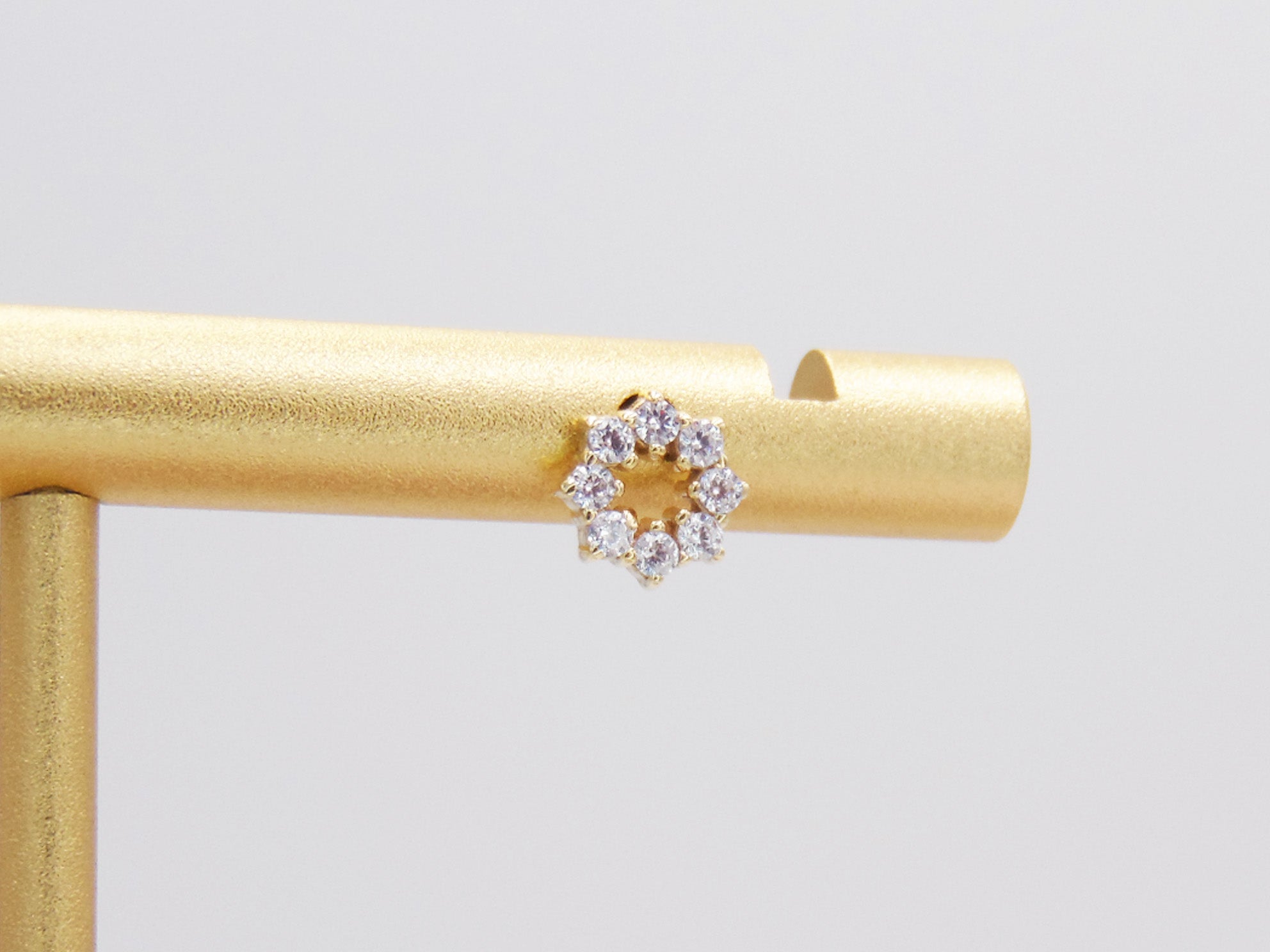 STUD CROWN WITH GOLDEN ZIRCONIAS