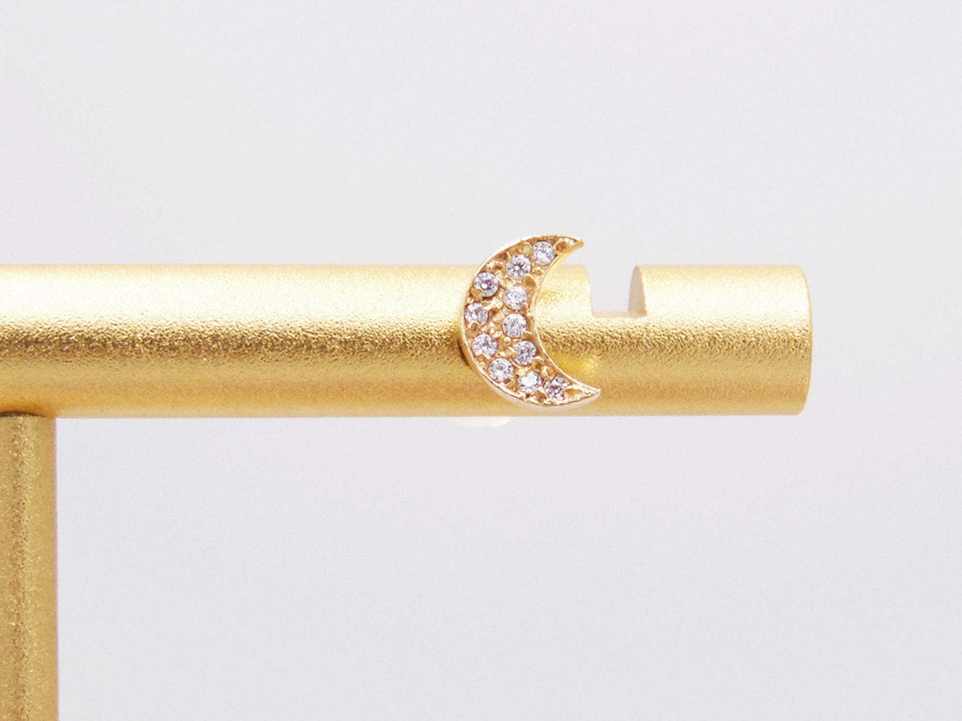 MOON STUD WITH GOLDEN ZIRCONIAS