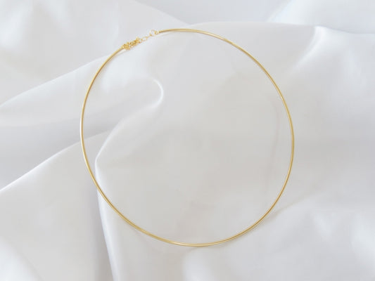 COLLAR RIGIDO DORADO