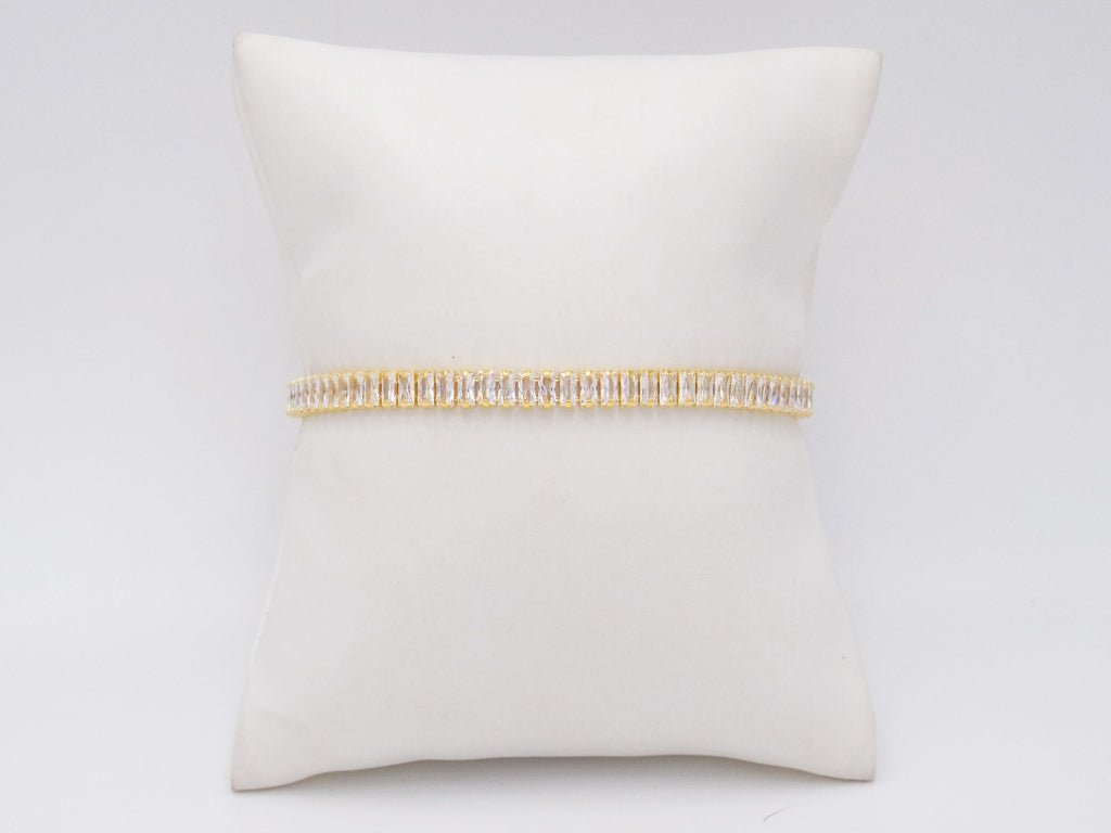 PULSERA AJUSTABLE CON BAGUETTES DORADA