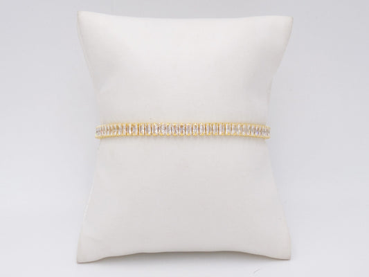 PULSERA AJUSTABLE CON BAGUETTES DORADA