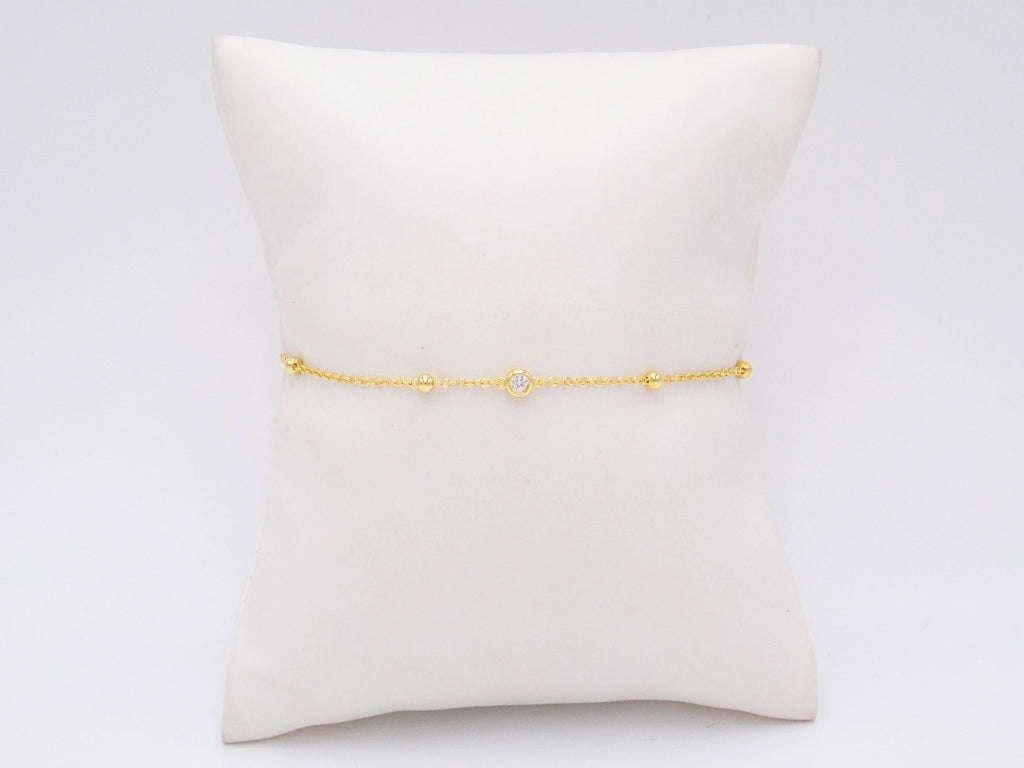 PULSERA DE BOLITAS CON 1 ZIRCONIA BISELADA