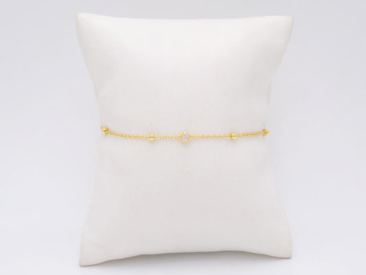 PULSERA DE BOLITAS CON 1 ZIRCONIA BISELADA